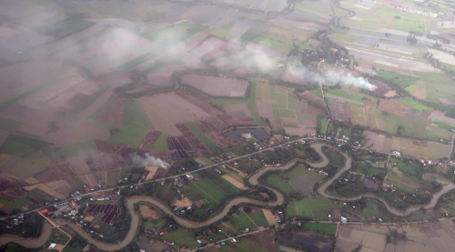 Aerial view of farmland and winding river captured during a LiDAR survey in Houston, TX